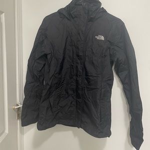 Like new size Medium  Black  North Face windbreaker with hood. 
Smoke free home